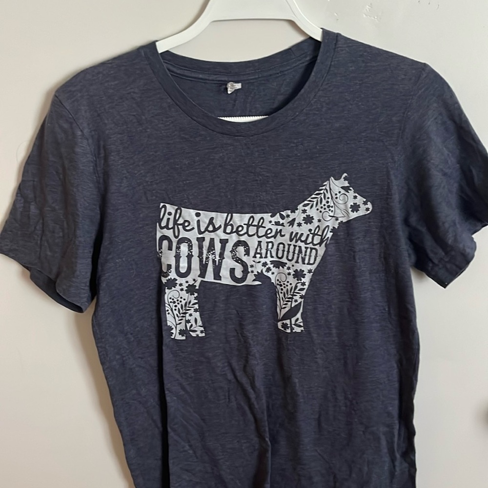 Small darker gray t shirt, “life is better with cows around”
